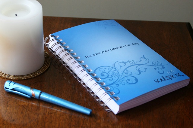 journal with candle