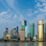 Shanghai skyline representing Asia ex-Japan equities as regional markets break higher and the AAXJ ETF approaches record highs