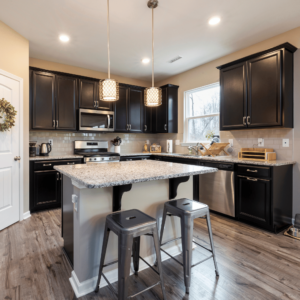 A sleek, modern kitchen in Singapore equipped with energy-efficient appliances, contributing to personal savings on utilities as part of effective money-saving strategies.