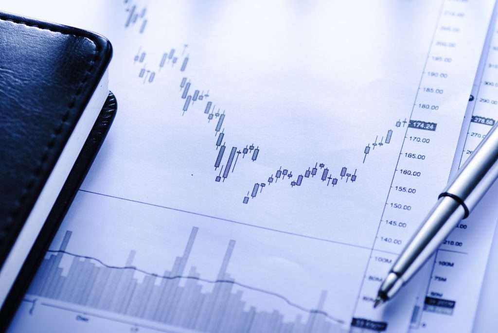 journal with business graph